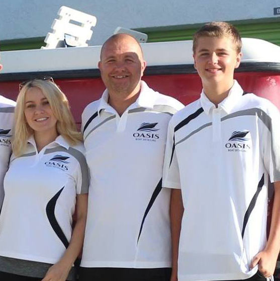 Ty mobile service specialist at Oasis Naples Boat Detailing on-site boat detailing and cleaning expert